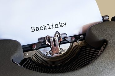 gray typewriter with white paper