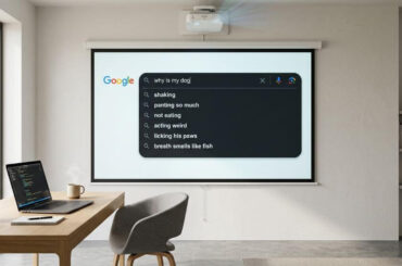 layar proyektor yang menampilkan Google Autocomplete